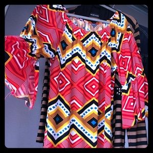 Can be worn as a dress or a tunic over leggings